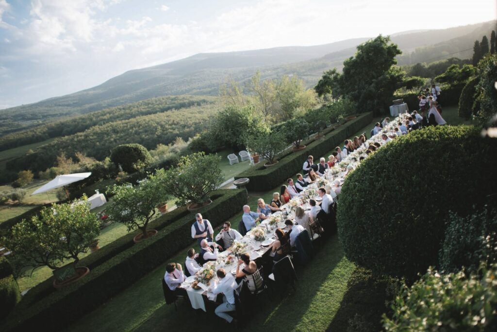 Borgo STomennano Wedding Guest with scenic view over tuscany countryside.