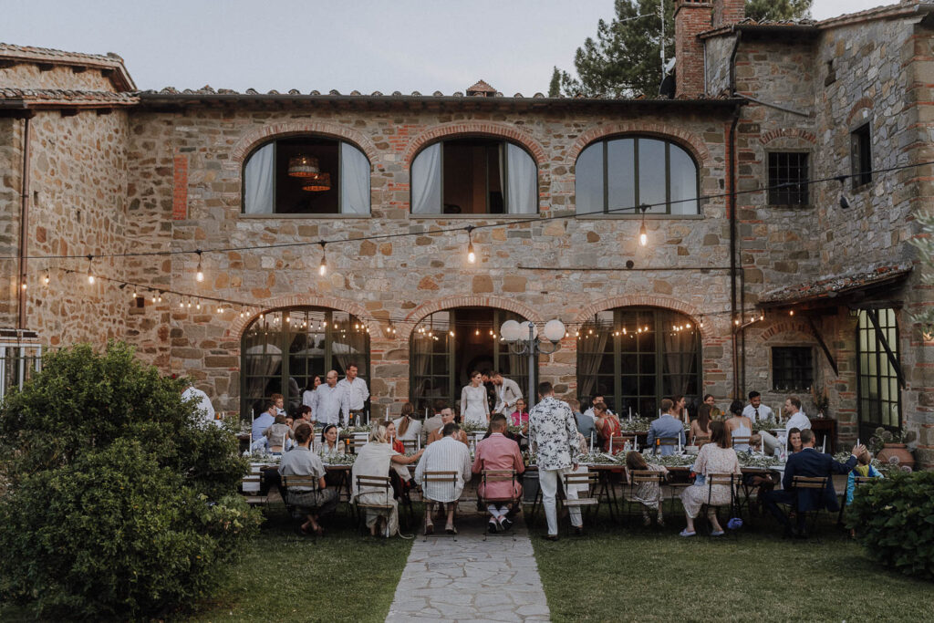 wonderful table setting with wedding guests sitting in front of a wonderful mallorca wedding venue