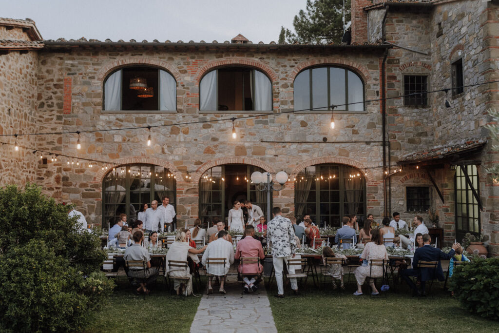 Outdoor dinner reception at a Tuscan villa wedding